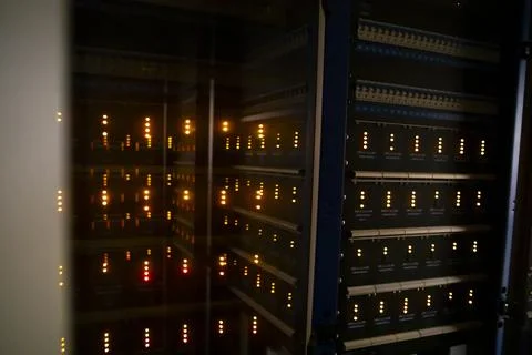 Dark server room with LED lights.  Central computer technology room of a sm.. Stock Photos