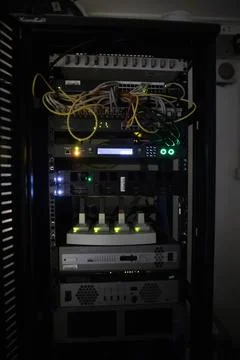 Dark server room with LED lights.  Central computer technology room of a sm.. Foto stock