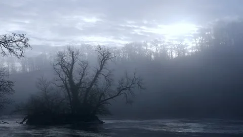 Dark Shadow Island in River – Mysterious and Eerie – 4K Stock-Footage 320163079