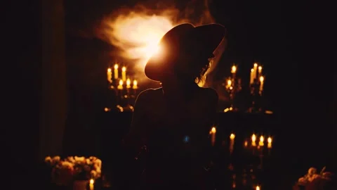 Dark shadow unrecognizable silhouette sexy woman posing in night ball room full Stock Footage 310307829
