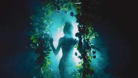 Dark shadow woman posing in black night neon blue magic light. Mystery lady Stock Footage 243568542