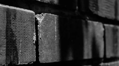 Dark shadows on a brick wall Stock Footage 34580380