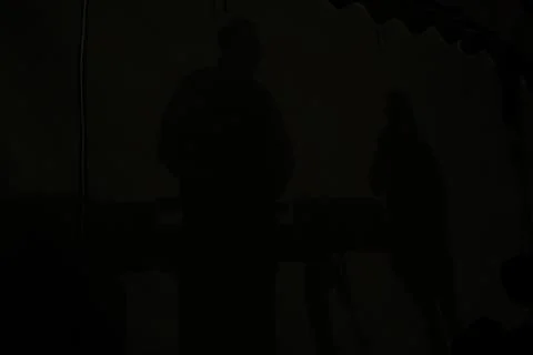 Dark shadows of musicians in Brona beach. Karaoke Noia. Galicia.Spain Foto stock