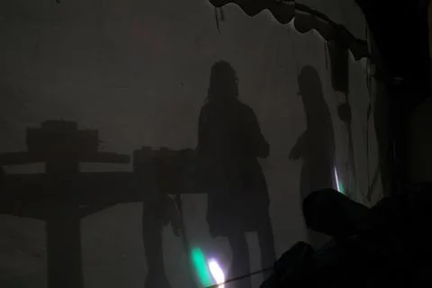 Dark shadows of musicians in Brona beach. Karaoke Noia. Galicia.Spain Stock Photos