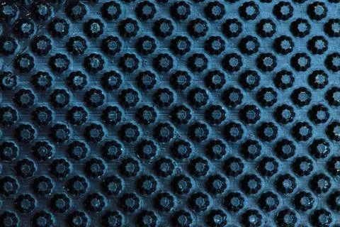 Dark shiny plastic background, star pattern Stock Photos