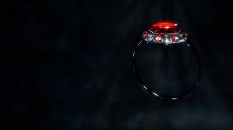 Dark silver metal ring with red ruby gems and free space, fictitious イラスト素材