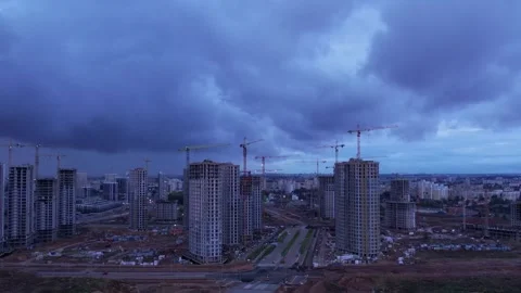 Dark sky and clouds. Сonstruction of new residential complexes Stock Footage 249990316