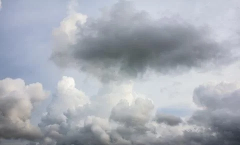 Dark sky and dramatic black cloud before rain. Stock Photos