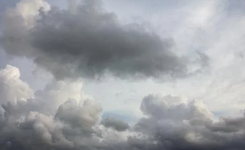 Dark sky and dramatic black cloud before rain. Stock Photos
