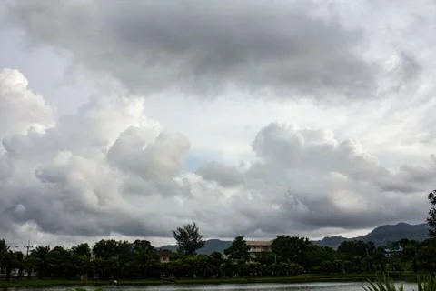 Dark sky and dramatic black cloud before rain. Stock Photos
