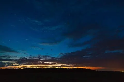 Dark sky with clouds after sunset. Stock Photos