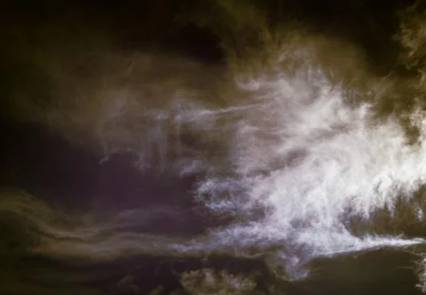 Dark sky with clouds, background for design, decoration or wallpaper. Stock Photos