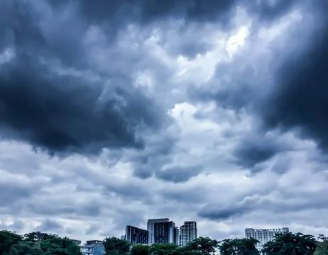 Dark sky , dark cloud and building Stock Photos