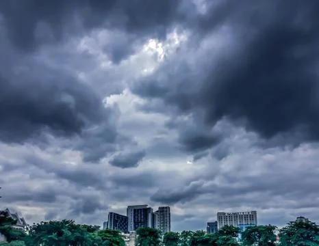 Dark sky , dark cloud and building Stock Photos