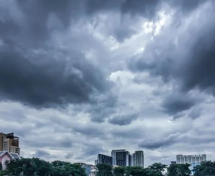 Dark sky , dark cloud and building Stock Photos