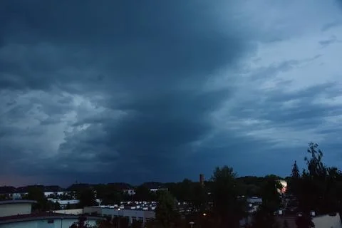 Dark sky, dark clouds. Dangerous and stormy weather in June, Wroclaw, Poland. Stock Photos