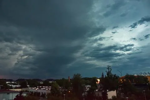 Dark sky, dark clouds. Dangerous and stormy weather in June, Wroclaw, Poland. Stock Photos