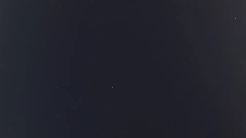 Dark sky displaying numerous twinkling distant stars forming a sparse pattern, Stock Footage 343476582