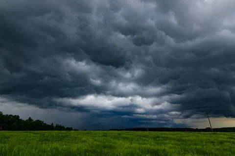 The Dark Sky with Heavy Clouds Converging and a Violent Storm. Bad or Moody.. Foto stock