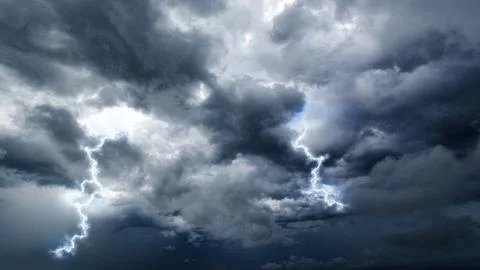 The dark sky with heavy clouds converging and a violent storm before the ra.. Stock Photos