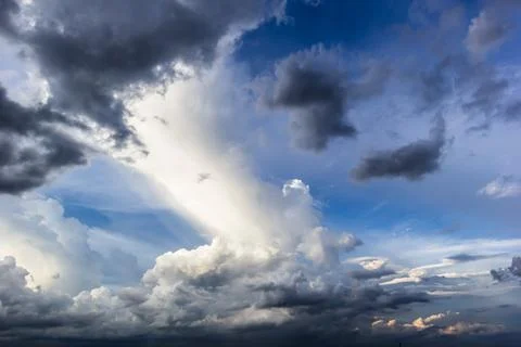 The dark sky with heavy clouds converging and a violent storm before the ra.. Stock Photos