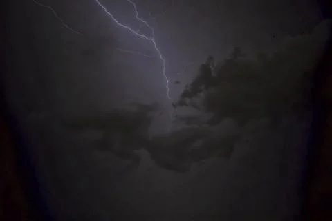 Dark sky with a lightning bolt Stock Photos