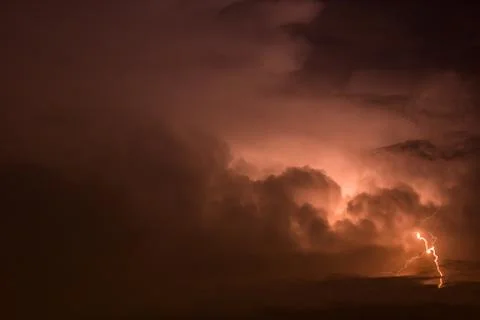 Dark Sky with lightning striking Stock Photos
