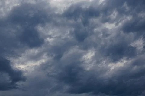 Dark sky with storm clouds Stock Photos