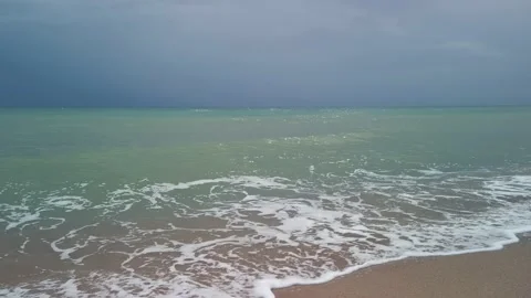 Dark sky on a stormy  day at beach Stock Footage 139978614