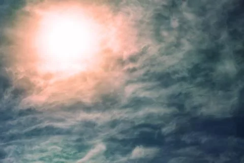 Dark sky with sun and cloud Stock Photos