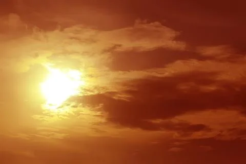Dark sky with sun and cloud Stock Photos