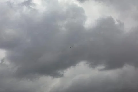 Dark sky is thunder-storm black and white clouds on a bad day during the rainy Stock Photos
