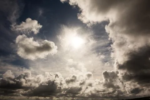 Dark sky with white clouds Stock Photos