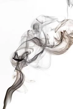 Dark smoke on a white background Stock Photos