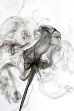 Dark smoke on a white background Stock Photos