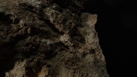 Dark stone with rugged surface texture Stock Footage 287876441