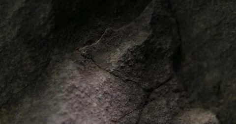 Dark Stone Surface with Natural Shadows and Textured Detail Video stock 290767679