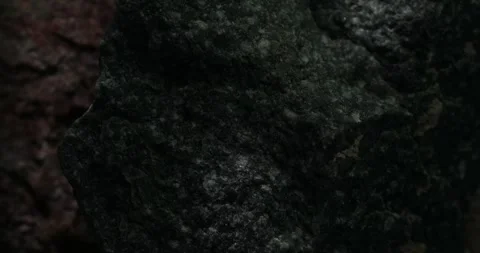 Dark stone texture close-up with rough natural surface Stock Footage 294163047
