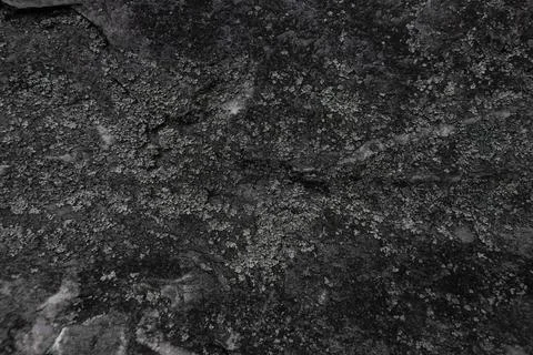 Dark stone texture with natural rough surface and layered structure in Czech Stock Photos