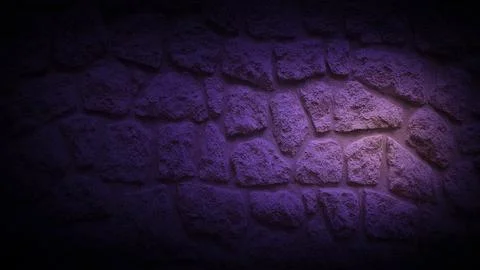 A dark stone wall background featuring a subtle gradient from deep purple t.. 写真素材