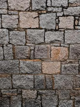 Dark stone wall texture Stock Photos