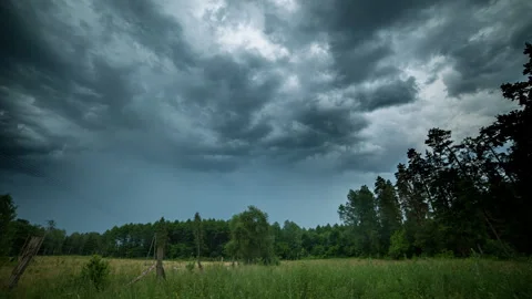 Dark storm clouds approaching. Storm time lapse. Stock Footage 245384600