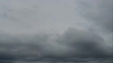 Dark storm clouds are moving fast at viewer - timelapse Stock Footage 67987816