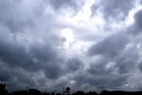 Dark storm clouds background After Raining. Stock Photos