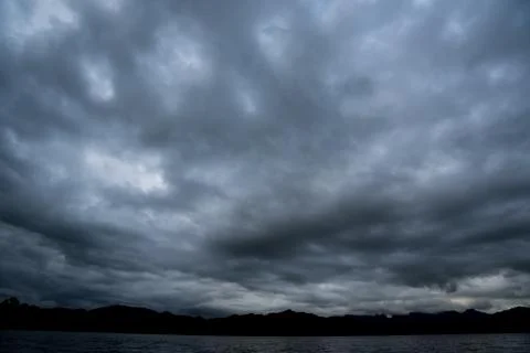 Dark storm clouds with background,Dark clouds before a thunder-storm. Stock Photos
