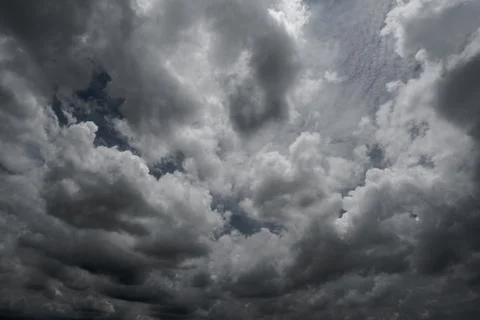 Dark storm clouds with background,Dark clouds before a thunder-storm. Photos