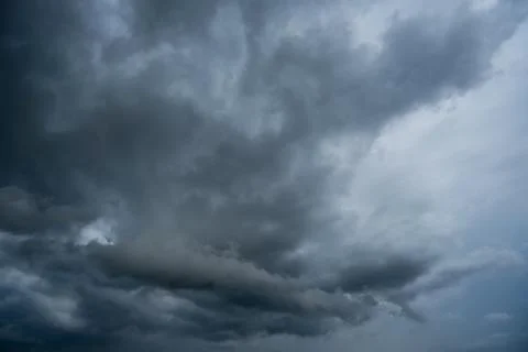 Dark storm clouds with background,Dark clouds before a thunder-storm. Stock Photos
