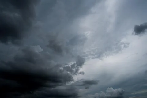 Dark storm clouds with background,Dark clouds before a thunder-storm. Stock Photos