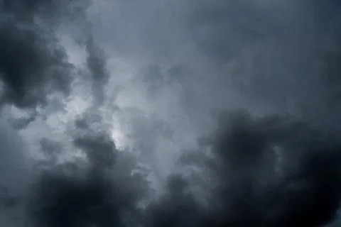Dark storm clouds with background,Dark clouds before a thunder-storm. Stock Photos