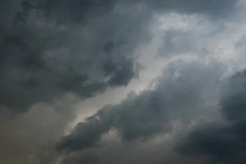 Dark storm clouds with background,Dark clouds before a thunder-storm. Stock Photos